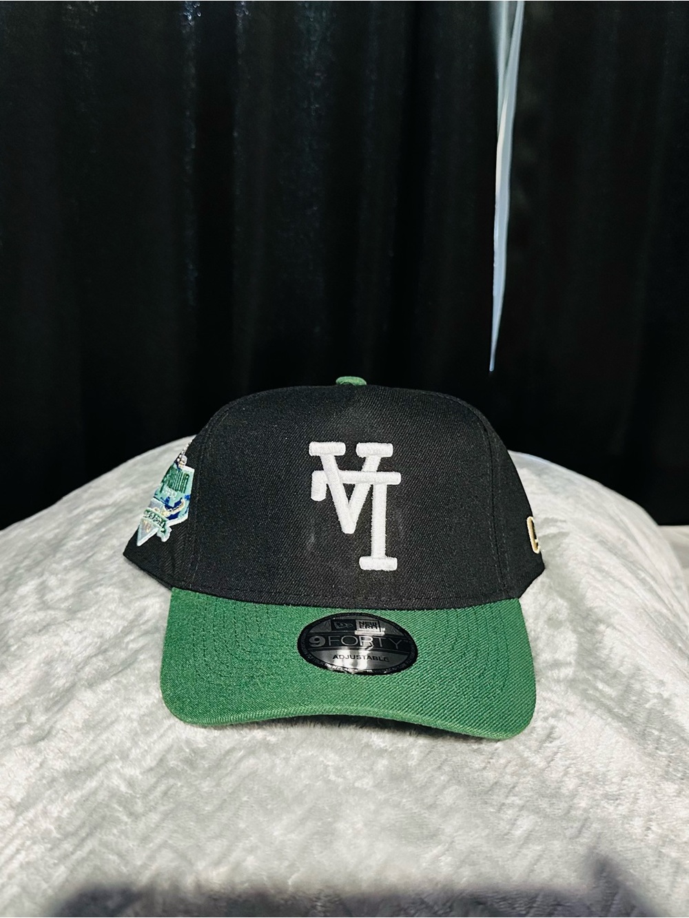 New Era Black and Green LA Logo Snapback Hat